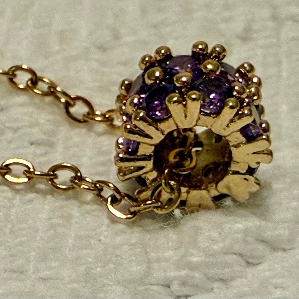 Necklace -apprx 16” gold tone w/circular pendant purple crystals - Picture 4 of 9